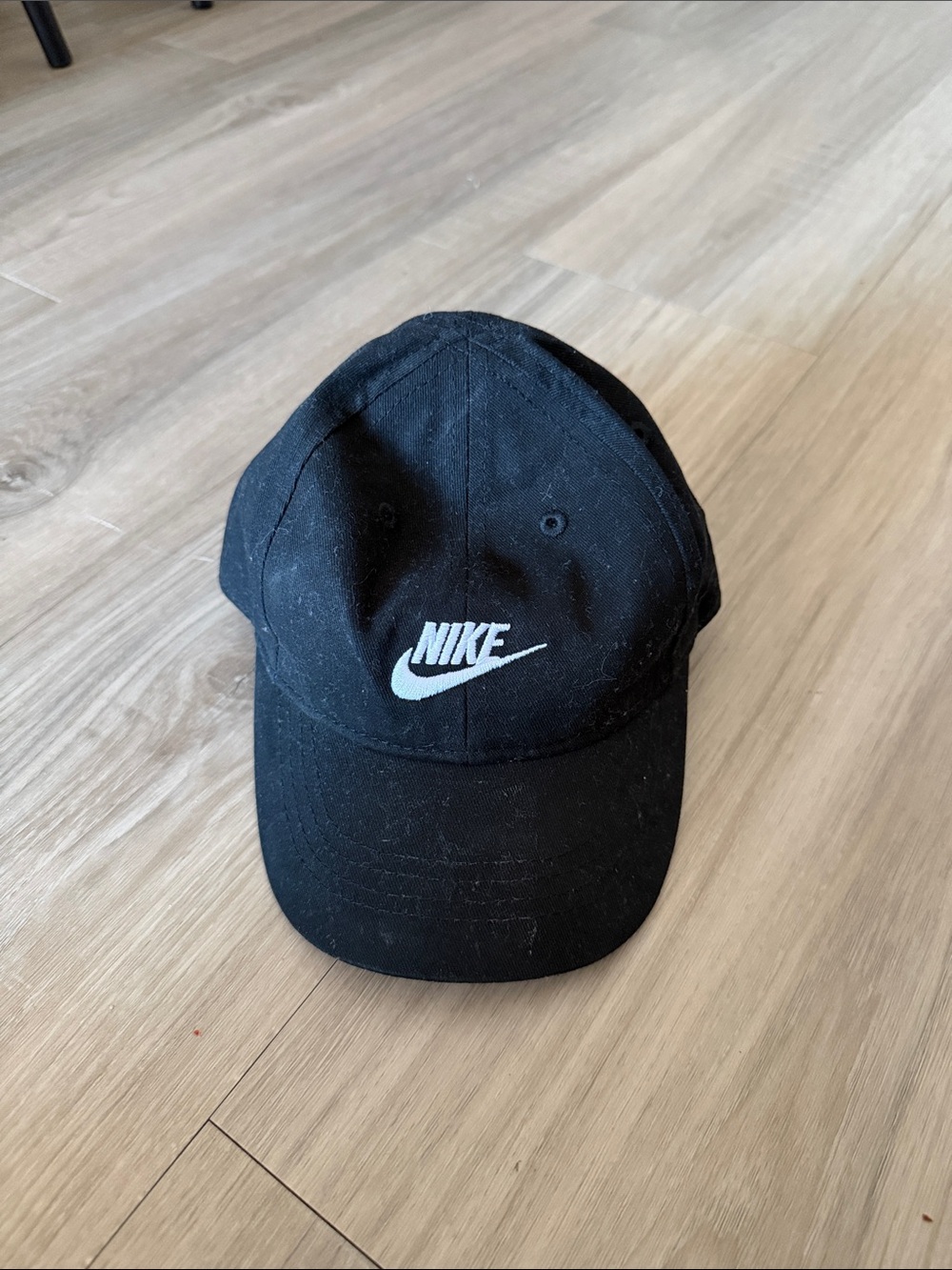 Nike Black Cap with White Swoosh Logo